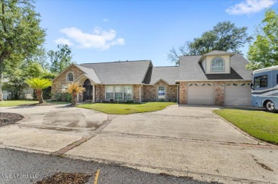 Stunning Waterfront Retreat in Gulf Hills - Ocean SpringsWelcome on Gulf Hills Golf Club in Mississippi - for sale on GolfHomes.com, golf home, golf lot