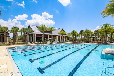 Enjoy waterfront views from this upgraded home, located in the on Golf Club At South Hampton in Florida - for sale on GolfHomes.com, golf home, golf lot