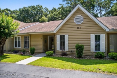 If you have been waiting for a townhome in The Woods section of on Sea Trail Golf Resort in North Carolina - for sale on GolfHomes.com, golf home, golf lot