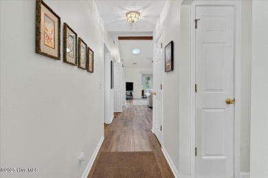If you have been waiting for a townhome in The Woods section of on Sea Trail Golf Resort in North Carolina - for sale on GolfHomes.com, golf home, golf lot