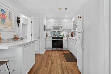 If you have been waiting for a townhome in The Woods section of on Sea Trail Golf Resort in North Carolina - for sale on GolfHomes.com, golf home, golf lot