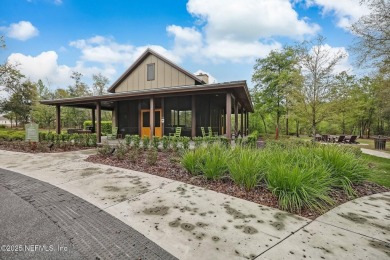 Enjoy waterfront views from this upgraded home, located in the on Golf Club At South Hampton in Florida - for sale on GolfHomes.com, golf home, golf lot