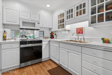 If you have been waiting for a townhome in The Woods section of on Sea Trail Golf Resort in North Carolina - for sale on GolfHomes.com, golf home, golf lot