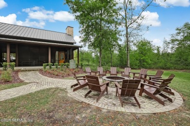 Welcome to this move-in-ready David Weekley home in the on Golf Club At South Hampton in Florida - for sale on GolfHomes.com, golf home, golf lot