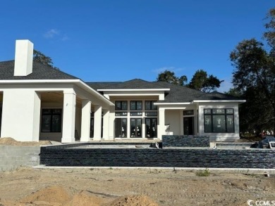 Custom Home Built on the waterway listed for Comp purposes on Barefoot Resort and Golf Club  in South Carolina - for sale on GolfHomes.com, golf home, golf lot