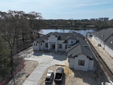 Custom Home Built on the waterway listed for Comp purposes on Barefoot Resort and Golf Club  in South Carolina - for sale on GolfHomes.com, golf home, golf lot