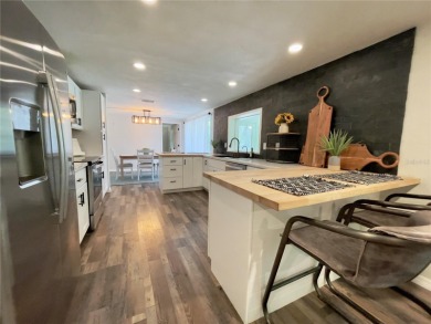 Looking for peace, privacy, and CHARM? This 2-bedroom on Beacon Woods Golf Club in Florida - for sale on GolfHomes.com, golf home, golf lot