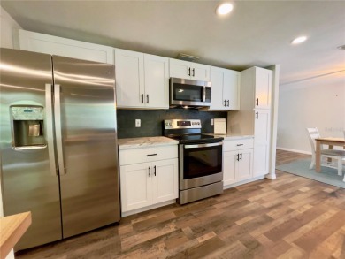 Looking for peace, privacy, and CHARM? This 2-bedroom on Beacon Woods Golf Club in Florida - for sale on GolfHomes.com, golf home, golf lot