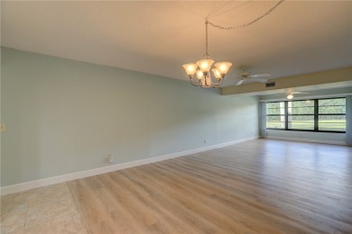Precious first-floor 2BD/2BA condo in a vibrant 55+ community on Vista Plantation Golf Club in Florida - for sale on GolfHomes.com, golf home, golf lot
