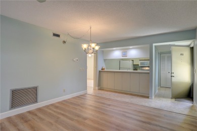 Precious first-floor 2BD/2BA condo in a vibrant 55+ community on Vista Plantation Golf Club in Florida - for sale on GolfHomes.com, golf home, golf lot