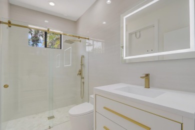 Discover luxury living in this completely renovated gem nestled on Frenchmans Creek Country Club in Florida - for sale on GolfHomes.com, golf home, golf lot