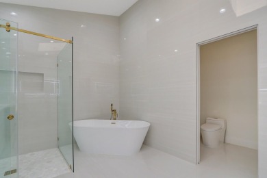 Discover luxury living in this completely renovated gem nestled on Frenchmans Creek Country Club in Florida - for sale on GolfHomes.com, golf home, golf lot
