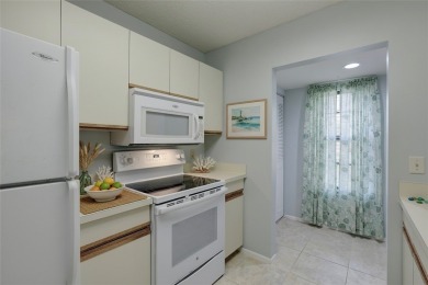 Precious first-floor 2BD/2BA condo in a vibrant 55+ community on Vista Plantation Golf Club in Florida - for sale on GolfHomes.com, golf home, golf lot