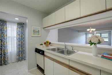 Precious first-floor 2BD/2BA condo in a vibrant 55+ community on Vista Plantation Golf Club in Florida - for sale on GolfHomes.com, golf home, golf lot