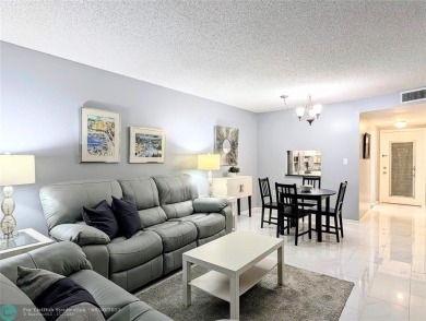 Schedule your appointment to see this BEAUTIFULLY UPDATED UNIT on Sunrise Country Club in Florida - for sale on GolfHomes.com, golf home, golf lot