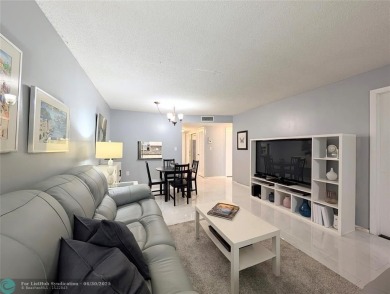 Schedule your appointment to see this BEAUTIFULLY UPDATED UNIT on Sunrise Country Club in Florida - for sale on GolfHomes.com, golf home, golf lot
