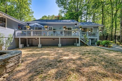 Lovely one story home with a beautiful level yard with mature on Wildcat Cliffs Country Club in North Carolina - for sale on GolfHomes.com, golf home, golf lot