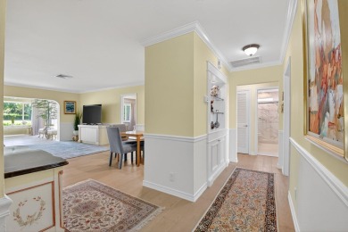THIS COMPLETELY REMODELED VILLA HAS WIDE OPEN VIEWS OF THE 15TH on Delray Dunes Golf and Country Club in Florida - for sale on GolfHomes.com, golf home, golf lot