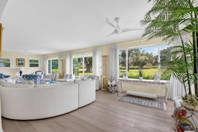 THIS COMPLETELY REMODELED VILLA HAS WIDE OPEN VIEWS OF THE 15TH on Delray Dunes Golf and Country Club in Florida - for sale on GolfHomes.com, golf home, golf lot