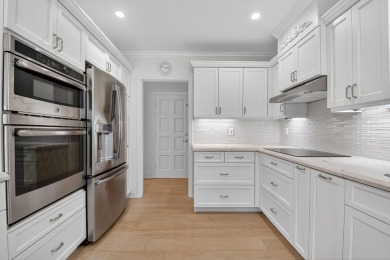 THIS COMPLETELY REMODELED VILLA HAS WIDE OPEN VIEWS OF THE 15TH on Delray Dunes Golf and Country Club in Florida - for sale on GolfHomes.com, golf home, golf lot