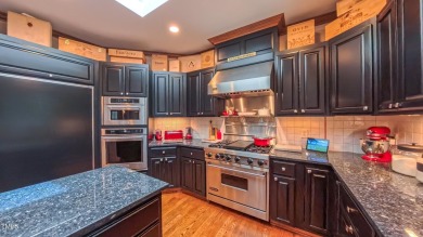 Welcome to an exceptional one-level estate nestled in the on Governors Club in North Carolina - for sale on GolfHomes.com, golf home, golf lot