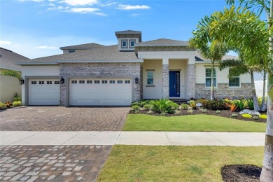 Under contract-accepting backup offers. 1028 Signet Drive on Apollo Beach Golf and Sea Club in Florida - for sale on GolfHomes.com, golf home, golf lot