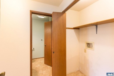 Enjoy easy living in this charming, nicely updated, 2 bed, 2 on SunLand Golf and Country Club in Washington - for sale on GolfHomes.com, golf home, golf lot