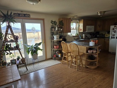 Check out this home in Dubois! This 3 bedroom, 2 bath home is on  in Wyoming - for sale on GolfHomes.com, golf home, golf lot