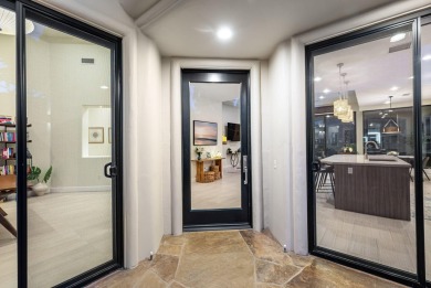 Experience luxury desert living in this impeccably remodeled on Mountain View Country Club in California - for sale on GolfHomes.com, golf home, golf lot