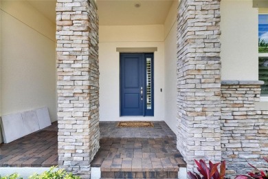 Under contract-accepting backup offers. 1028 Signet Drive on Apollo Beach Golf and Sea Club in Florida - for sale on GolfHomes.com, golf home, golf lot