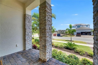 Under contract-accepting backup offers. 1028 Signet Drive on Apollo Beach Golf and Sea Club in Florida - for sale on GolfHomes.com, golf home, golf lot