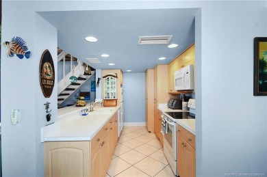 Gorgeous three bedroom three bath fully furnished unit offers a on Ocean Club At the Hutchinson Island Beach Resort in Florida - for sale on GolfHomes.com, golf home, golf lot