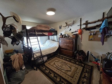 Check out this home in Dubois! This 3 bedroom, 2 bath home is on  in Wyoming - for sale on GolfHomes.com, golf home, golf lot