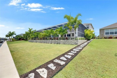 Under contract-accepting backup offers. 1028 Signet Drive on Apollo Beach Golf and Sea Club in Florida - for sale on GolfHomes.com, golf home, golf lot