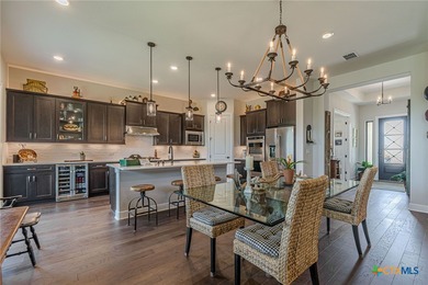 Perched high above the 5th hole and tucked into native mesquite on Kissing Tree Golf Club in Texas - for sale on GolfHomes.com, golf home, golf lot