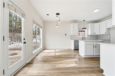 Welcome home to this beautifully renovated 4-bedroom, 2-bath on Trophy Club of Apalachee in Georgia - for sale on GolfHomes.com, golf home, golf lot