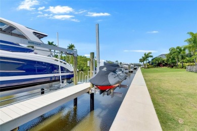 Under contract-accepting backup offers. 1028 Signet Drive on Apollo Beach Golf and Sea Club in Florida - for sale on GolfHomes.com, golf home, golf lot