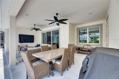 Under contract-accepting backup offers. 1028 Signet Drive on Apollo Beach Golf and Sea Club in Florida - for sale on GolfHomes.com, golf home, golf lot