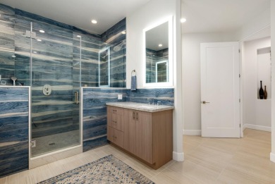 Experience luxury desert living in this impeccably remodeled on Mountain View Country Club in California - for sale on GolfHomes.com, golf home, golf lot