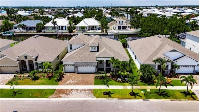 Under contract-accepting backup offers. 1028 Signet Drive on Apollo Beach Golf and Sea Club in Florida - for sale on GolfHomes.com, golf home, golf lot