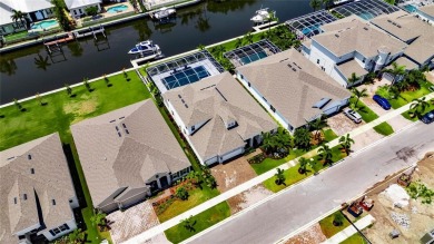 Under contract-accepting backup offers. 1028 Signet Drive on Apollo Beach Golf and Sea Club in Florida - for sale on GolfHomes.com, golf home, golf lot
