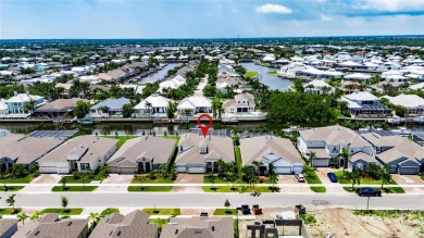 Under contract-accepting backup offers. 1028 Signet Drive on Apollo Beach Golf and Sea Club in Florida - for sale on GolfHomes.com, golf home, golf lot