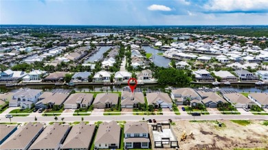 Under contract-accepting backup offers. 1028 Signet Drive on Apollo Beach Golf and Sea Club in Florida - for sale on GolfHomes.com, golf home, golf lot