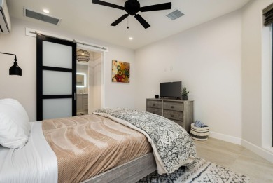Experience luxury desert living in this impeccably remodeled on Mountain View Country Club in California - for sale on GolfHomes.com, golf home, golf lot