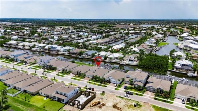 Under contract-accepting backup offers. 1028 Signet Drive on Apollo Beach Golf and Sea Club in Florida - for sale on GolfHomes.com, golf home, golf lot