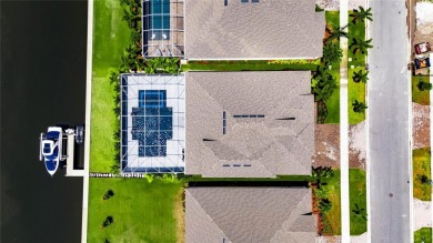 Under contract-accepting backup offers. 1028 Signet Drive on Apollo Beach Golf and Sea Club in Florida - for sale on GolfHomes.com, golf home, golf lot