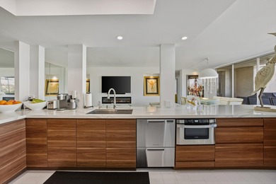 LOCATION & VIEWS. Be wowed in this stunning condo, where luxury on Desert Island Golf and Country Club in California - for sale on GolfHomes.com, golf home, golf lot