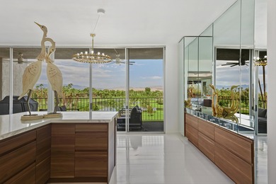 LOCATION & VIEWS. Be wowed in this stunning condo, where luxury on Desert Island Golf and Country Club in California - for sale on GolfHomes.com, golf home, golf lot