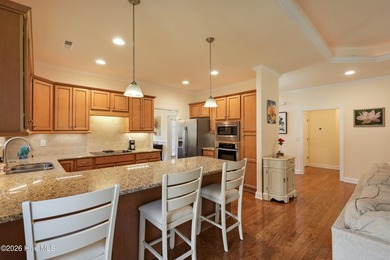 Bright & cheery end unit townhome with low maintenance brick on Cape Fear National At Brunswick Forest in North Carolina - for sale on GolfHomes.com, golf home, golf lot