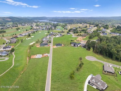 This half acre lot offers views of TN Nationals 13th and 14th on Tennessee National Golf Club in Tennessee - for sale on GolfHomes.com, golf home, golf lot